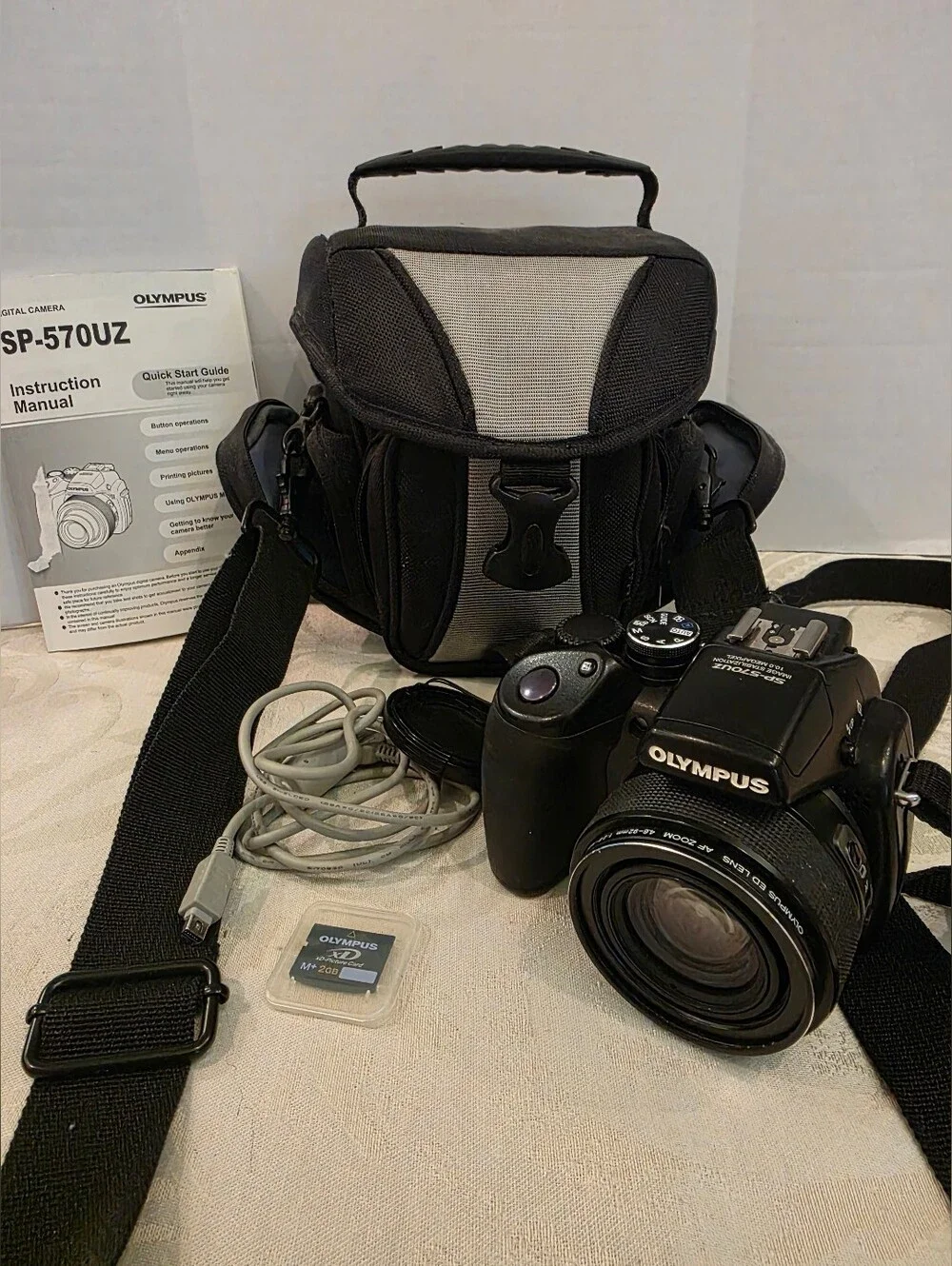 Olympus SP-57OUz 10MP CCD AA Battery Digital Camera/Strap& Lens Cap/ Case